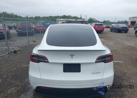 2023 Tesla Model Y Performance Dual Motor All-Wheel Drive z USA, uszkodzony, nr VIN 7SAYGDEF3PF603431